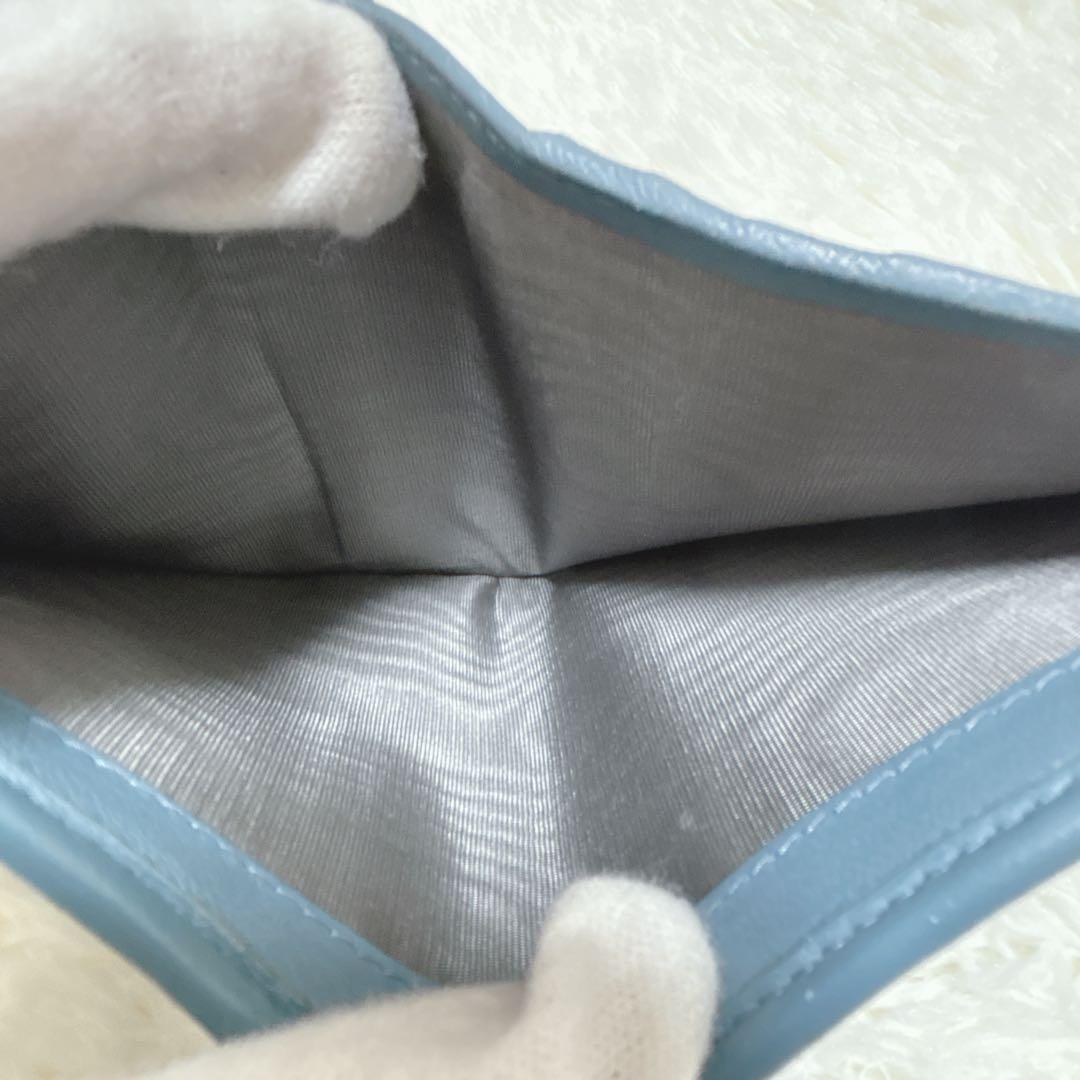 極美品✨️miumiu マテラッセ 二つ折り財布 ロゴ金具 ブルー 現行ロゴ