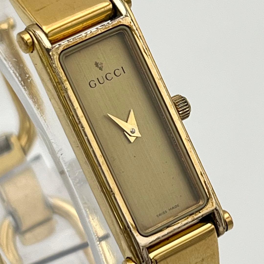 新品電池 GUCCI 1500L ゴールド文字盤 ベゼル バングルウォッチ 時計