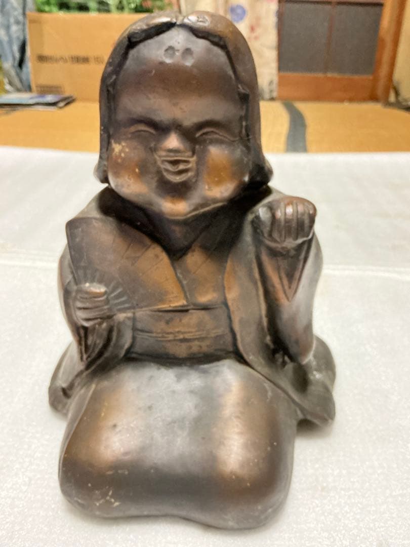 ブロンズ製のお多福さん。【重量が5kgもあります】。