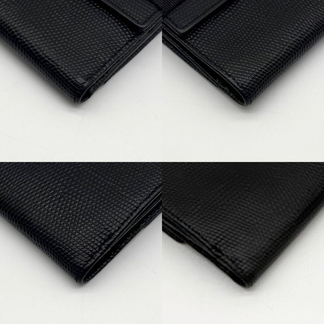 【極美品】Ferragamo レザー 二つ折り財布 ヴァラリボン 黒 コンパクト