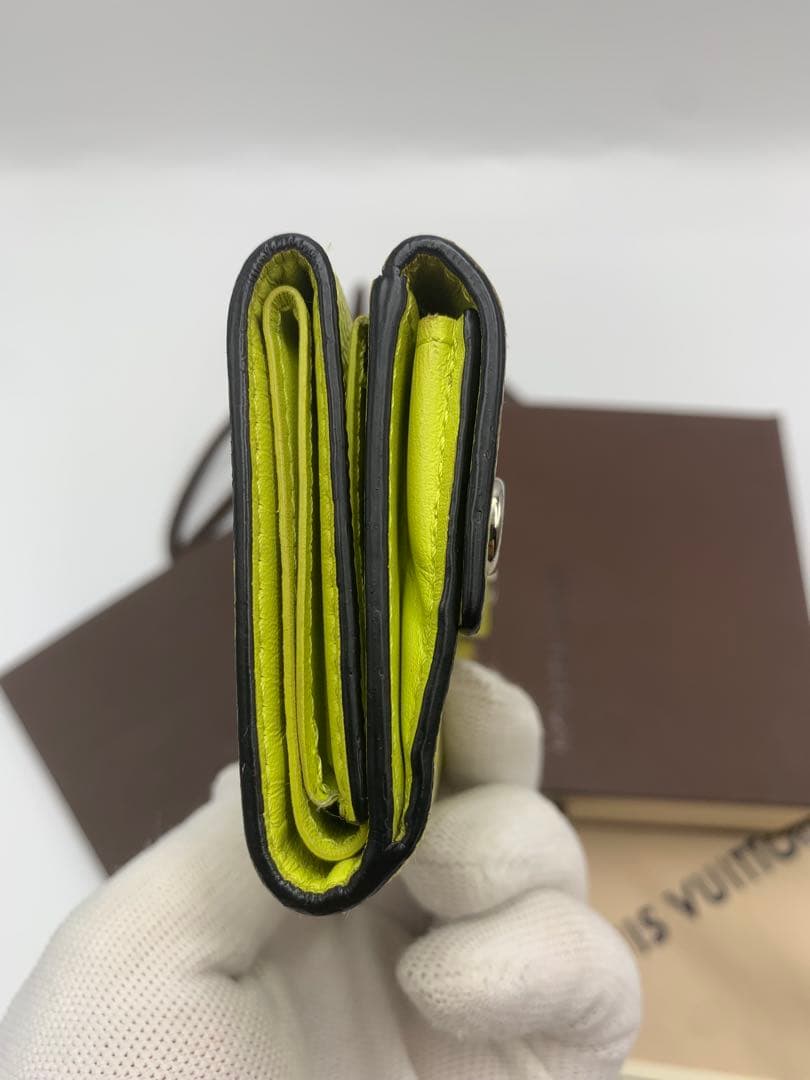 ルイヴィトン タイガラマ ディスカバリーコンパクト イエロー 折り財布 P55