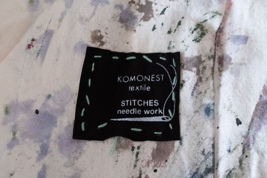 KOMONEST　アトリエコート　ロングコート　アート　福祉施設