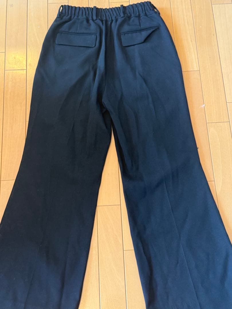 パンツ HEAVY WOOL FLARE TROUSERS SUBLATIONS