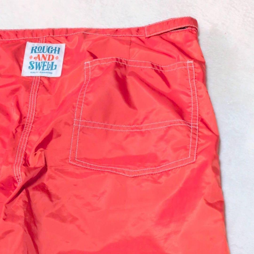 【rough & swell】ナイロン ゴルフパンツ ウエスト調整 オレンジ L