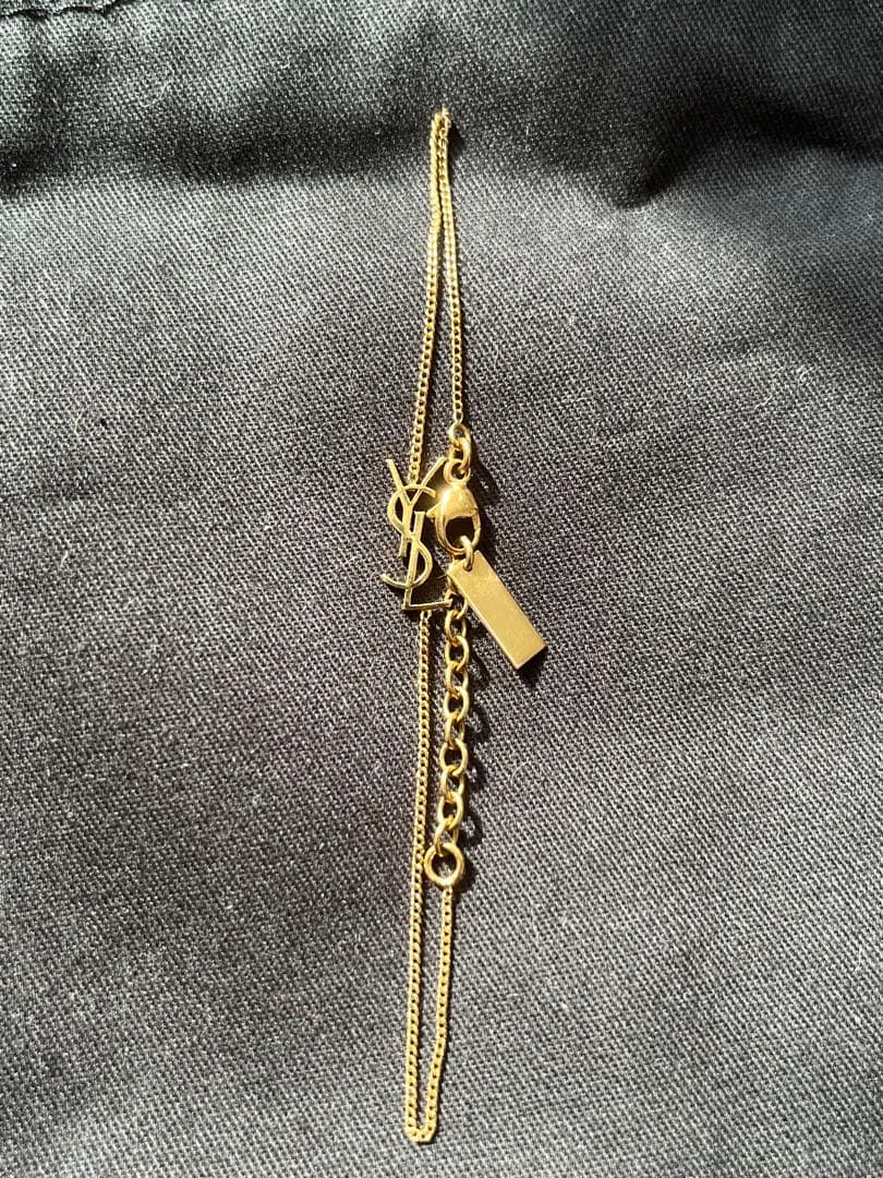 サンローラン ブレスレット モノグラム チャーム ブラス ゴールド　カサンドラ