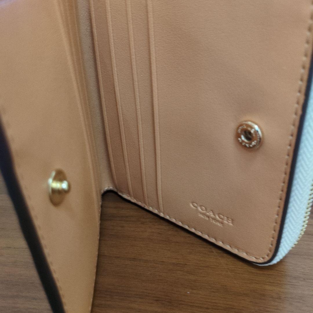m*u様 COACH 花柄 二つ折り財布