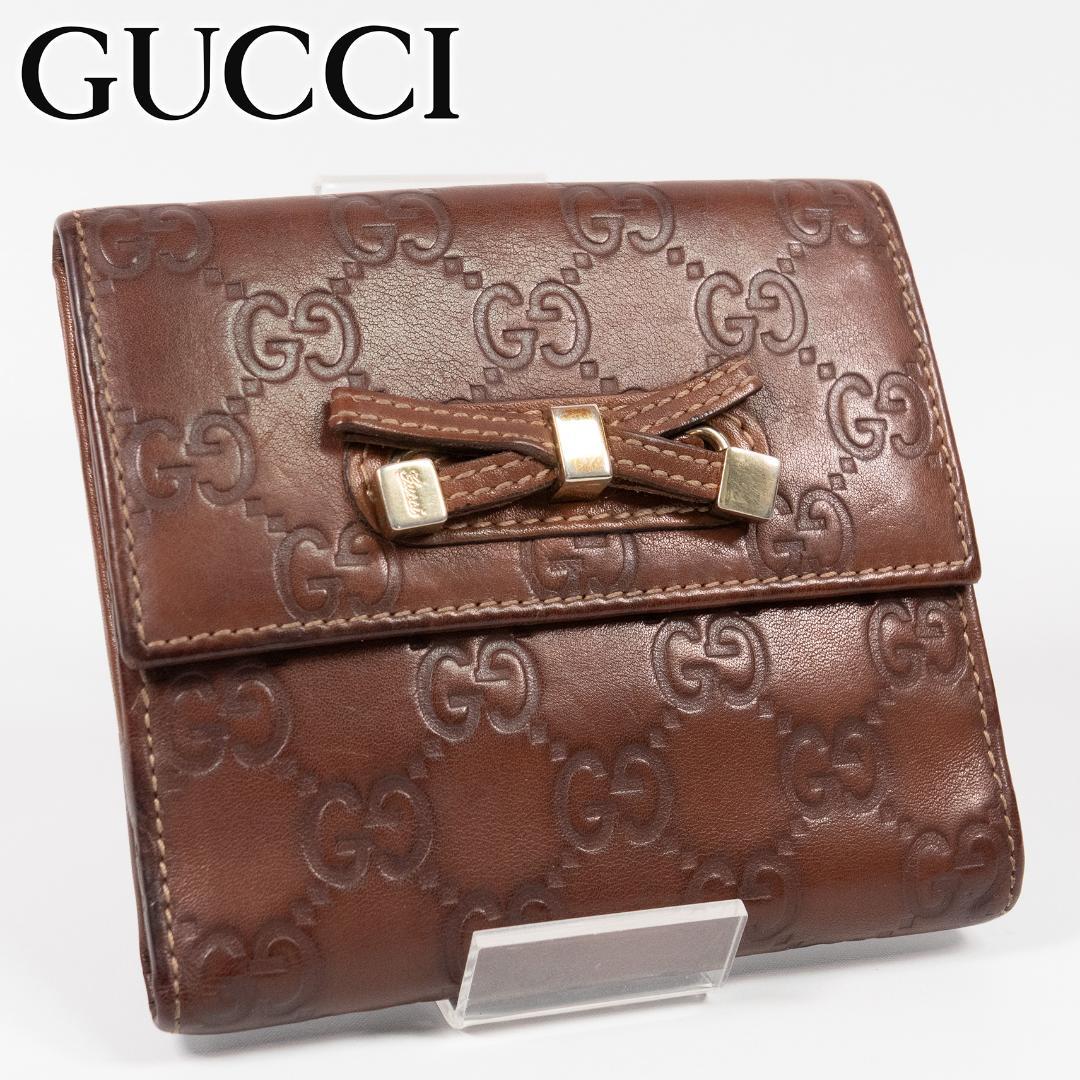 美品✨ GUCCI グッチ 二つ折り財布 シマ リボン ブラウン