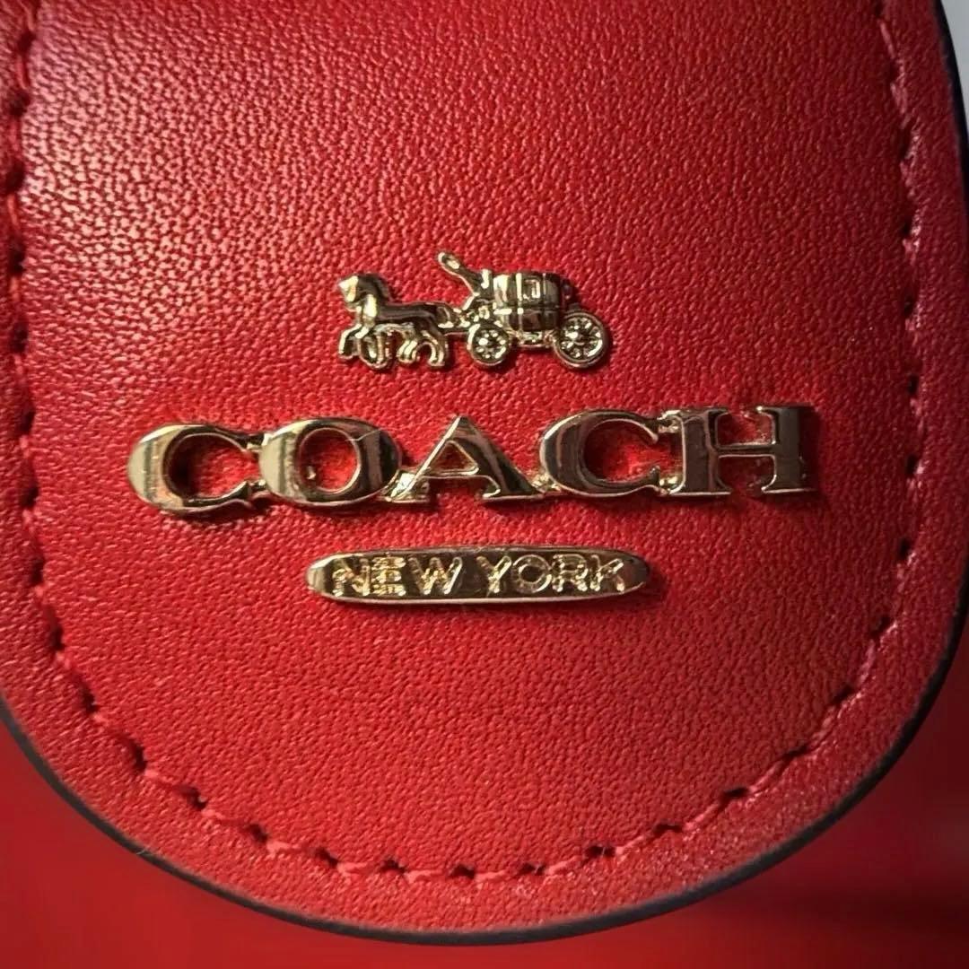 COACH リンゴ柄 二つ折り財布