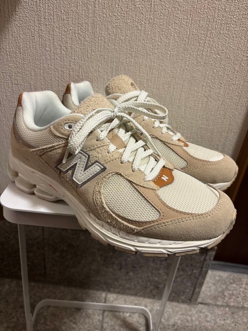 New Balance ベージュ スニーカー