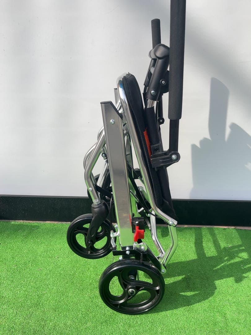 RAKU折りたたみ持ち運び易い介 助用車椅子