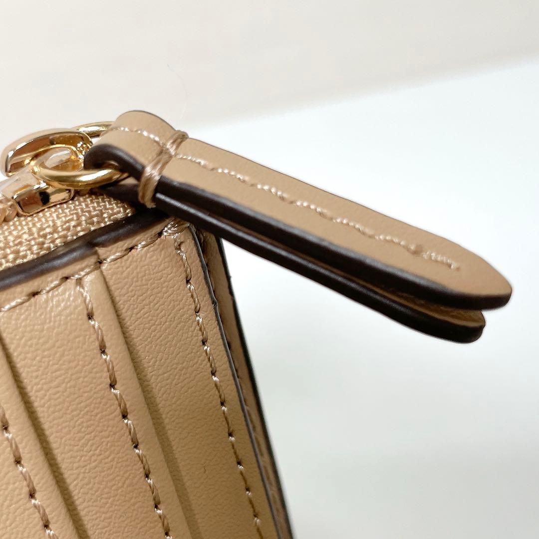 ちょっぴり大人なミニ財布✨MICHAEL KORS カルメン 二つ折り財布