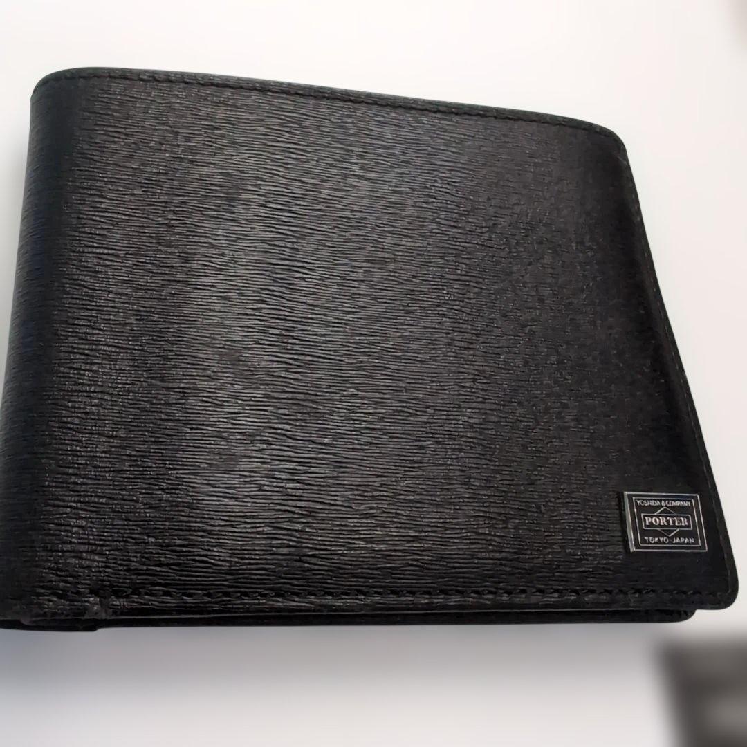 PORTER折り財布　カレント　ブラック　レザー　フラップ　ブランドロゴ金具