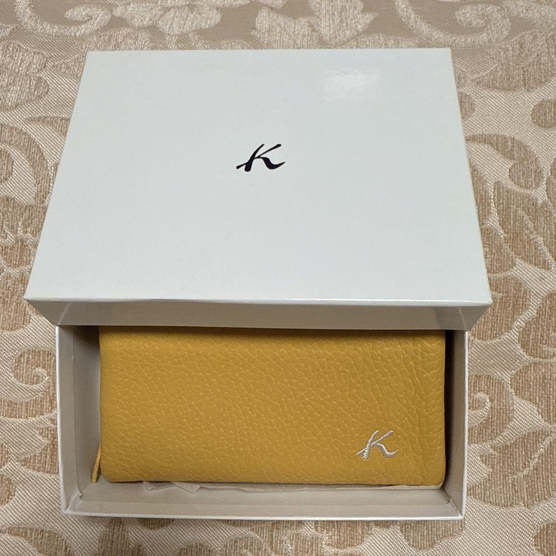 キタムラ　イエロー 二つ折り財布