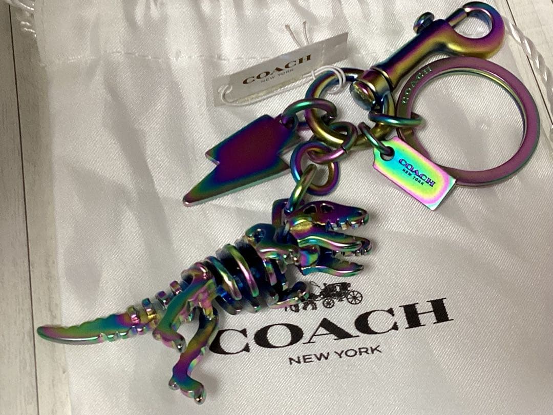 タグ保存袋付き未使用美品コーチCOACH レインボー恐竜キーホルダー本物
