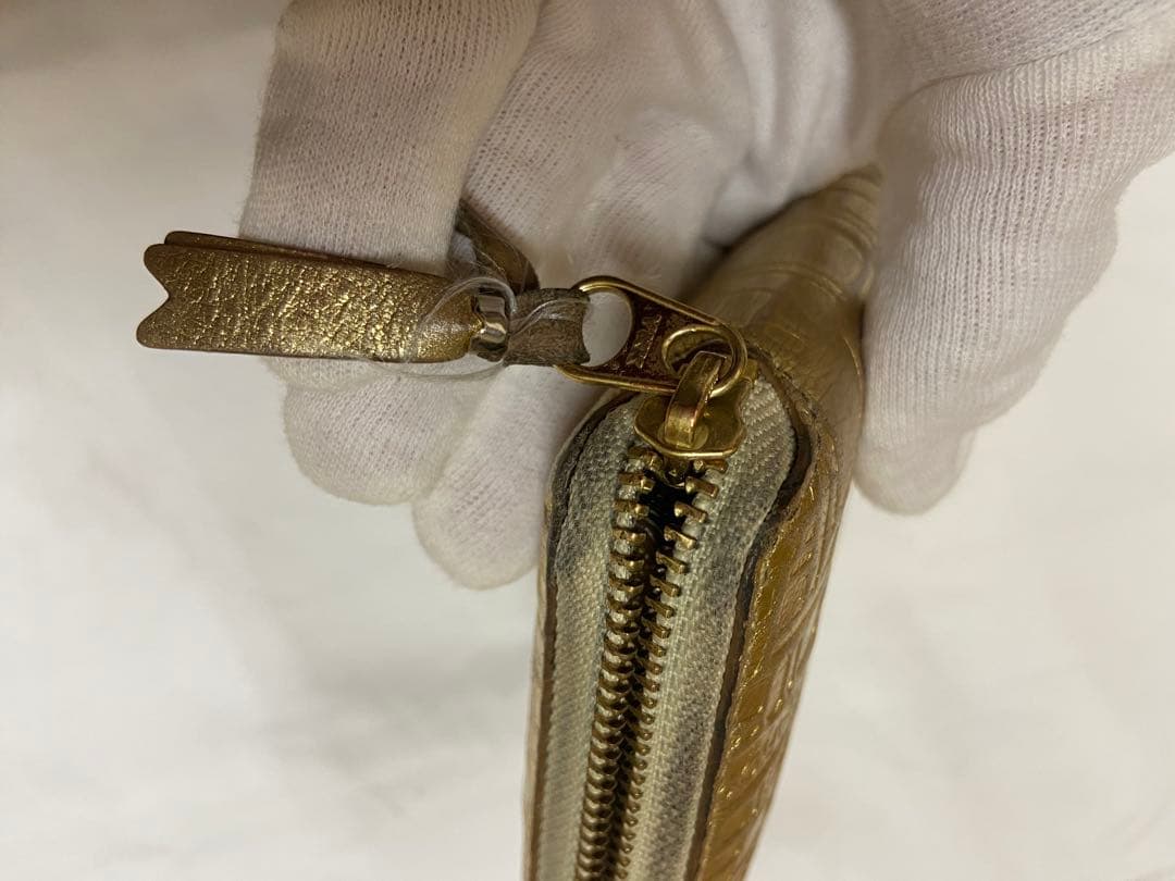 COMME des GARÇONS ゴールド二つ折り財布