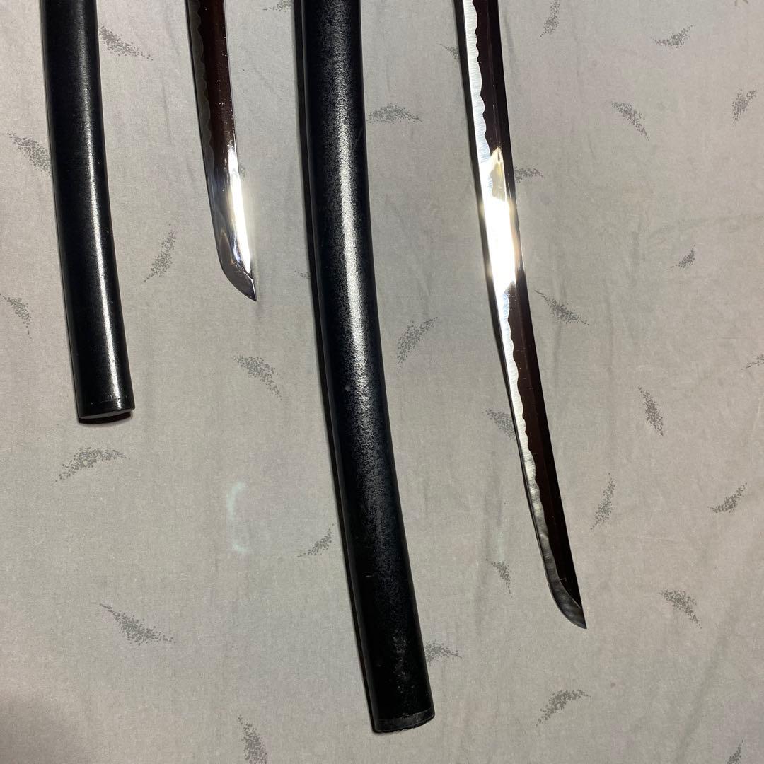 模造刀大(刀袋付)小2本 黒柄 雲龍楕円鍔 黒梨地鞘