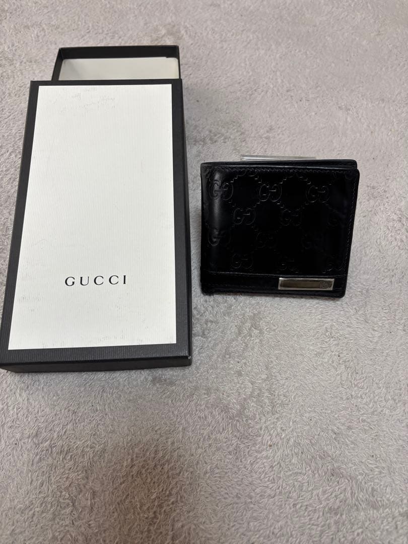 y*1様 GUCCI ブラックレザー 二つ折り財布