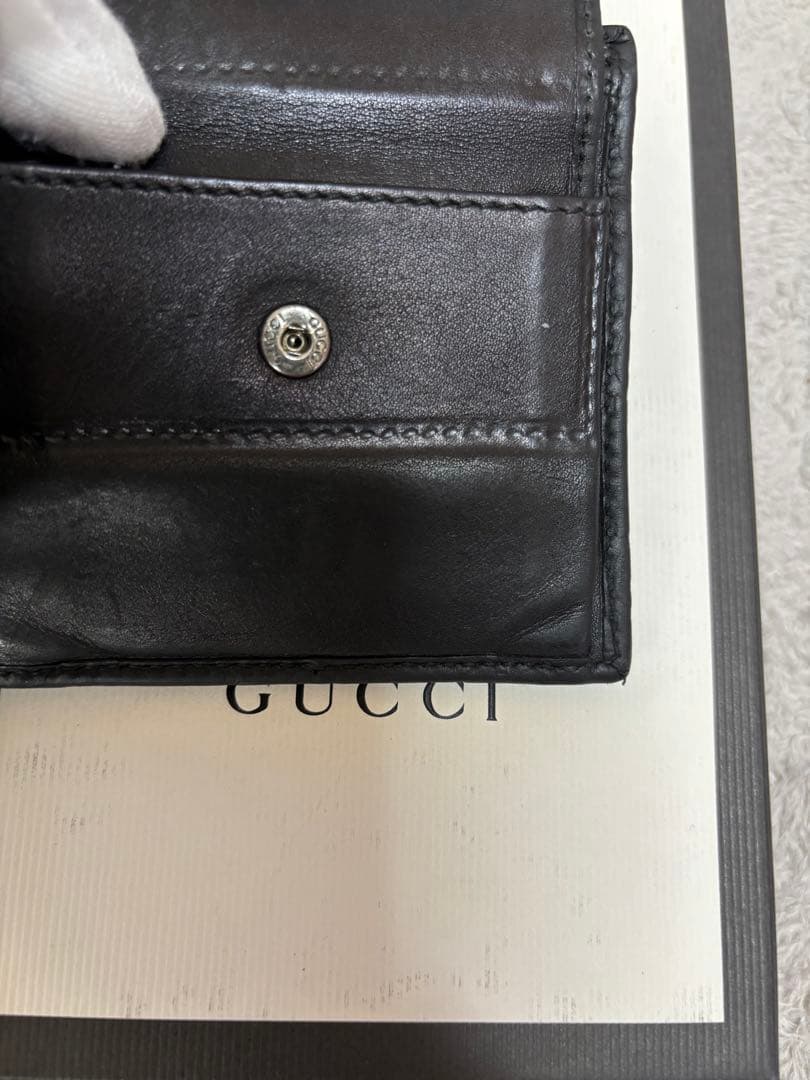 y*1様 GUCCI ブラックレザー 二つ折り財布