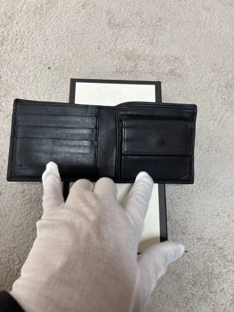 y*1様 GUCCI ブラックレザー 二つ折り財布