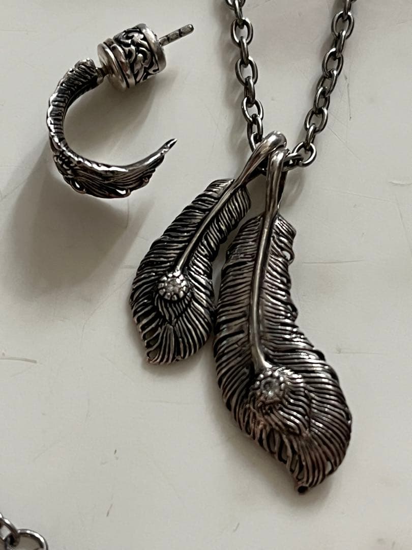 ZOCA LOシルバー羽ペンダント