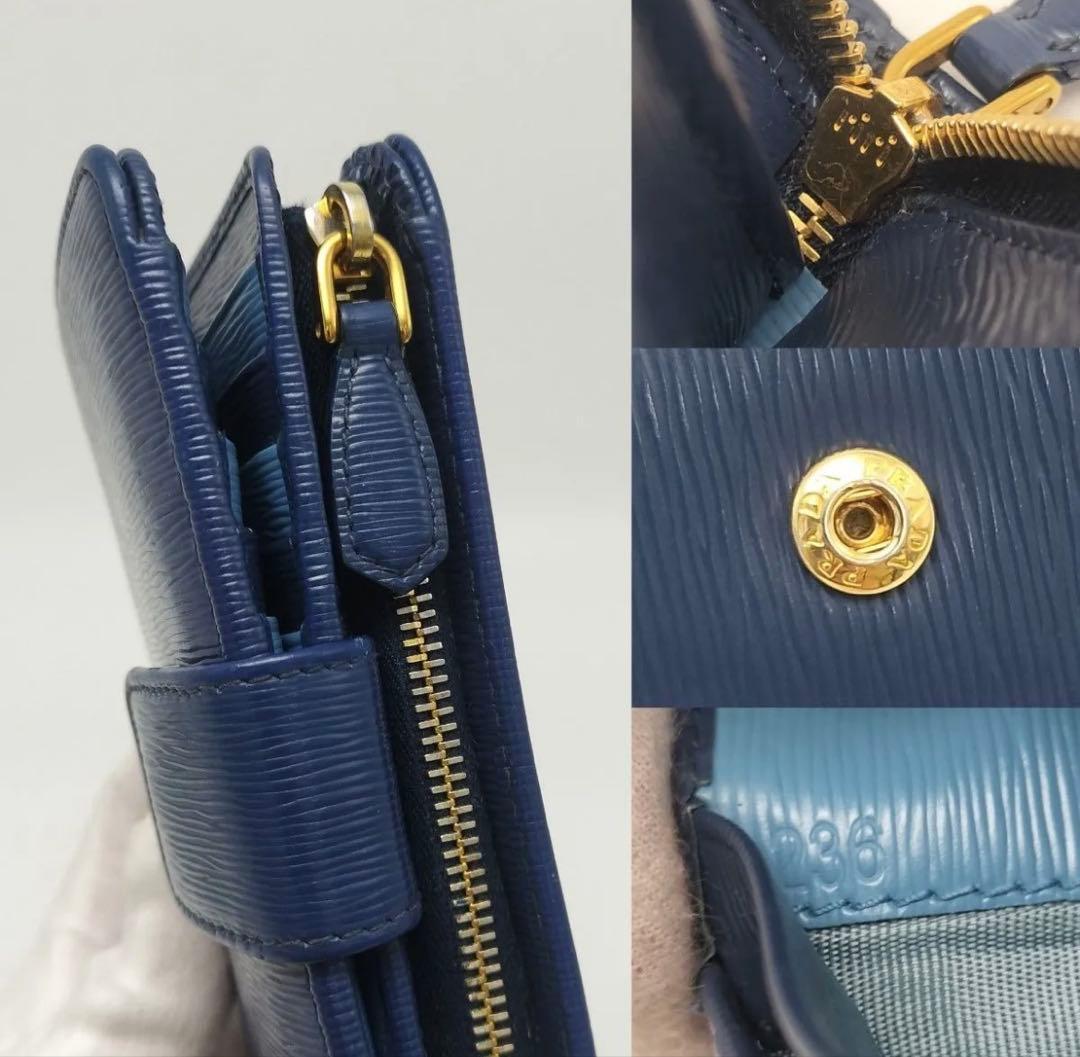 超美品　PRADA サフィアーノレザー　二つ折り財布 ブルーラウンドファスナー