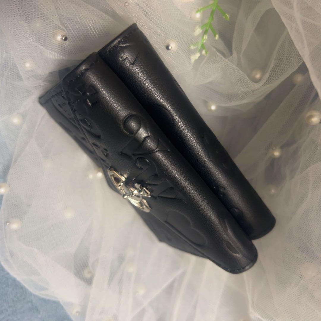 VivienneWestwood黒いエンボス三つ折り財布