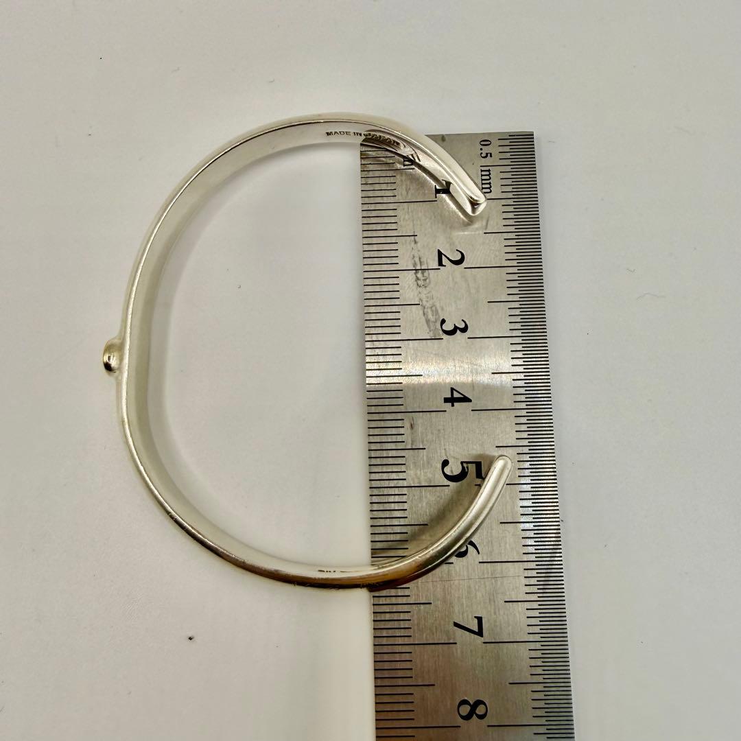 アリゾナフリーダム　k18太陽神付き甲丸バングル　B-15b 定価52690円