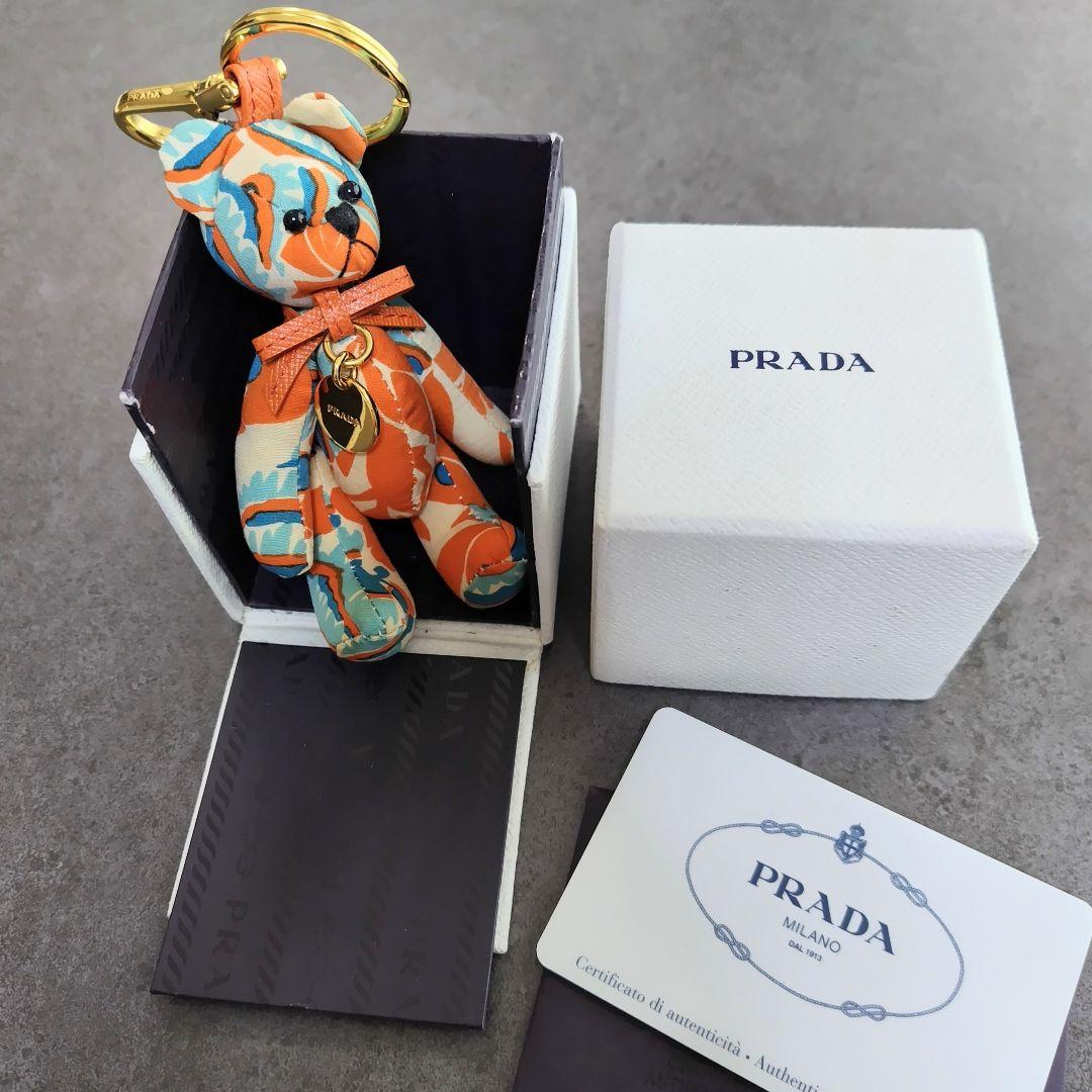 未使用保管品✨プラダ◇テディベアキーホルダー　レザーリボンゴールド金具オレンジ