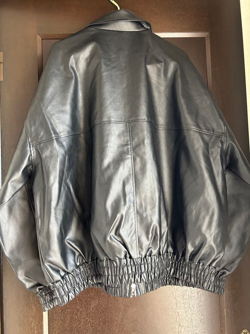 ネンネストア　フェイクレザーダブルジップスタンドブルゾン　レザージャケット