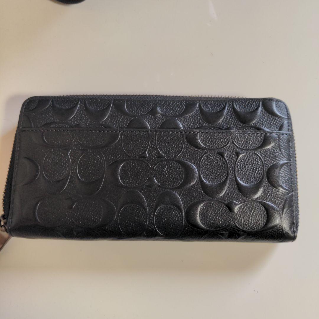 コーチ　COACHブラックpvcレザー エンボス加工 長財布