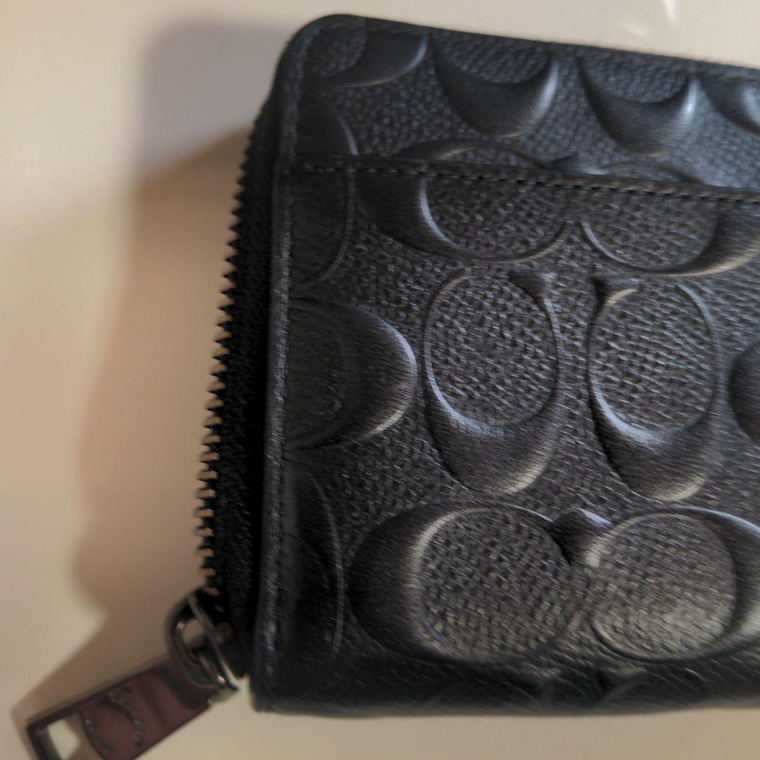 コーチ　COACHブラックpvcレザー エンボス加工 長財布