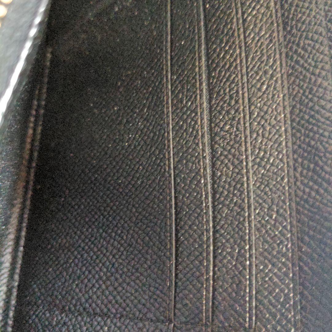 コーチ　COACHブラックpvcレザー エンボス加工 長財布