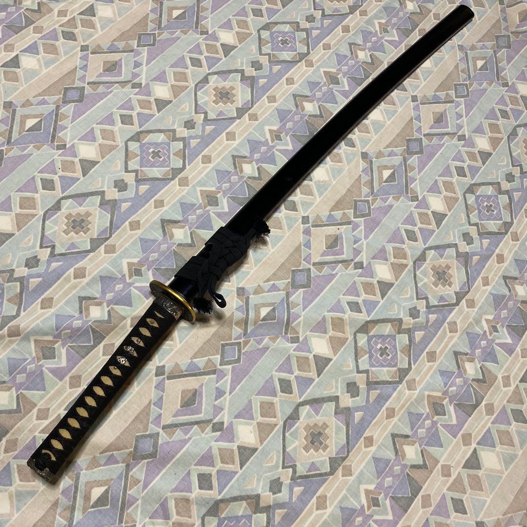 上級居合刀 黒柄 鶴波図楕円鍔 黒呂鞘