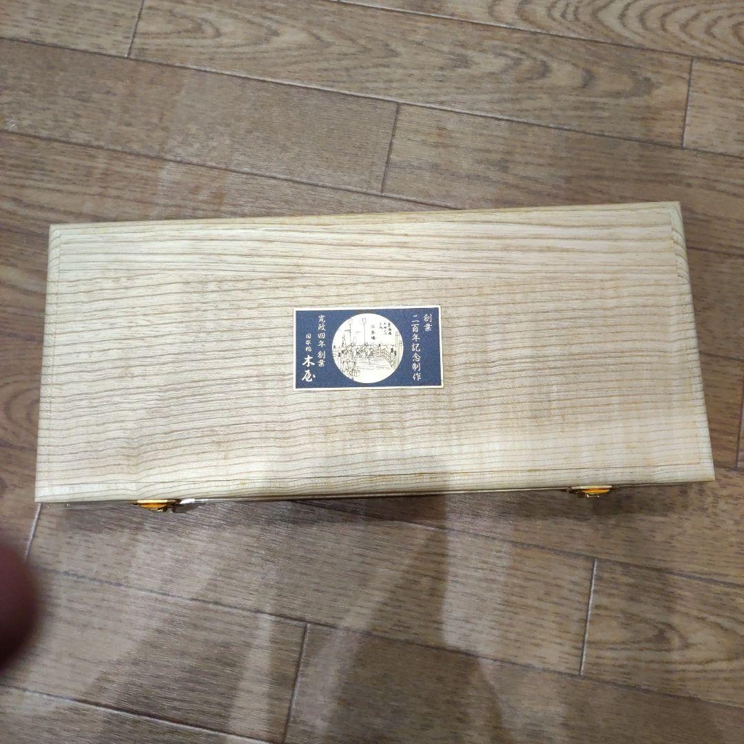 日本橋木屋　200年記念49層墨流しスーパーゴールド粉末鋼包丁+古代檜のまな板