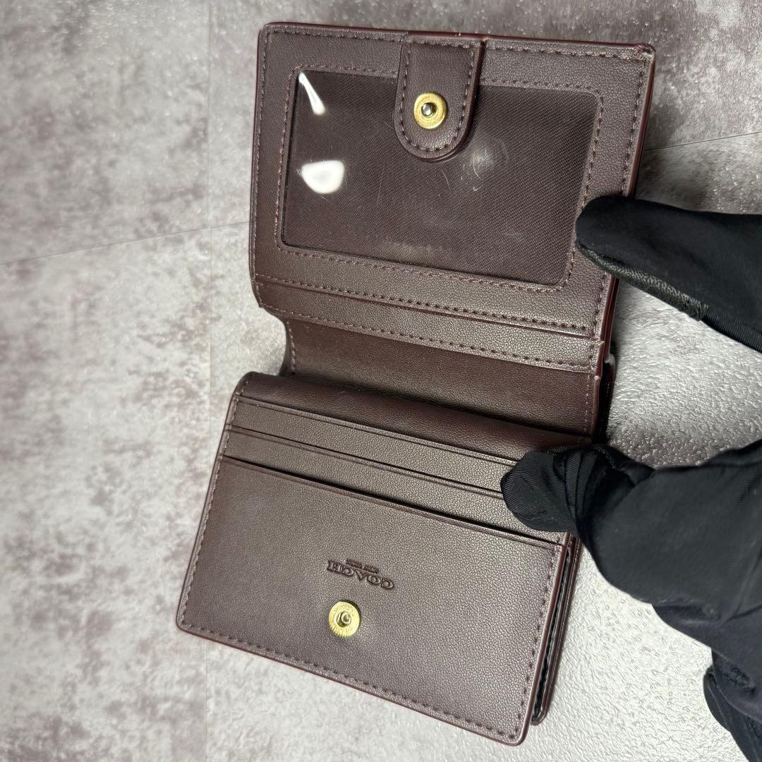 コーチ COACH ロゴ ヘリテージ レザー スナップ 二つ折り財布