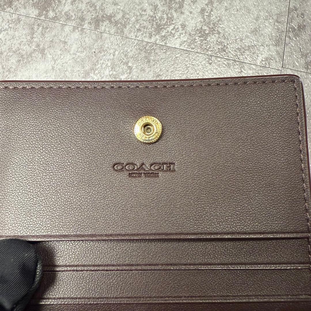 コーチ COACH ロゴ ヘリテージ レザー スナップ 二つ折り財布