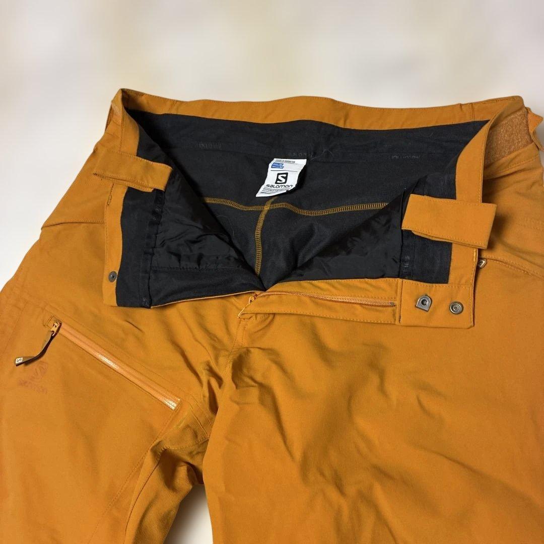 スキースノーボード　サロモンウェア ダークグリーン/オレンジパンツ