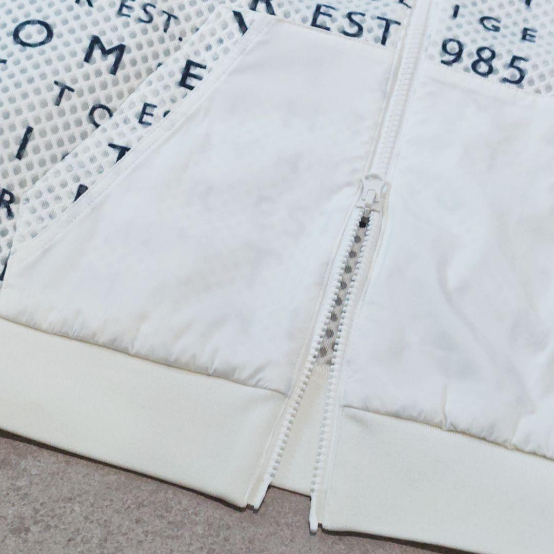 【トミーヒルフィガーゴルフ】ロゴ総柄メッシュブルゾン ジャンパー 袖リブ ゴルフ