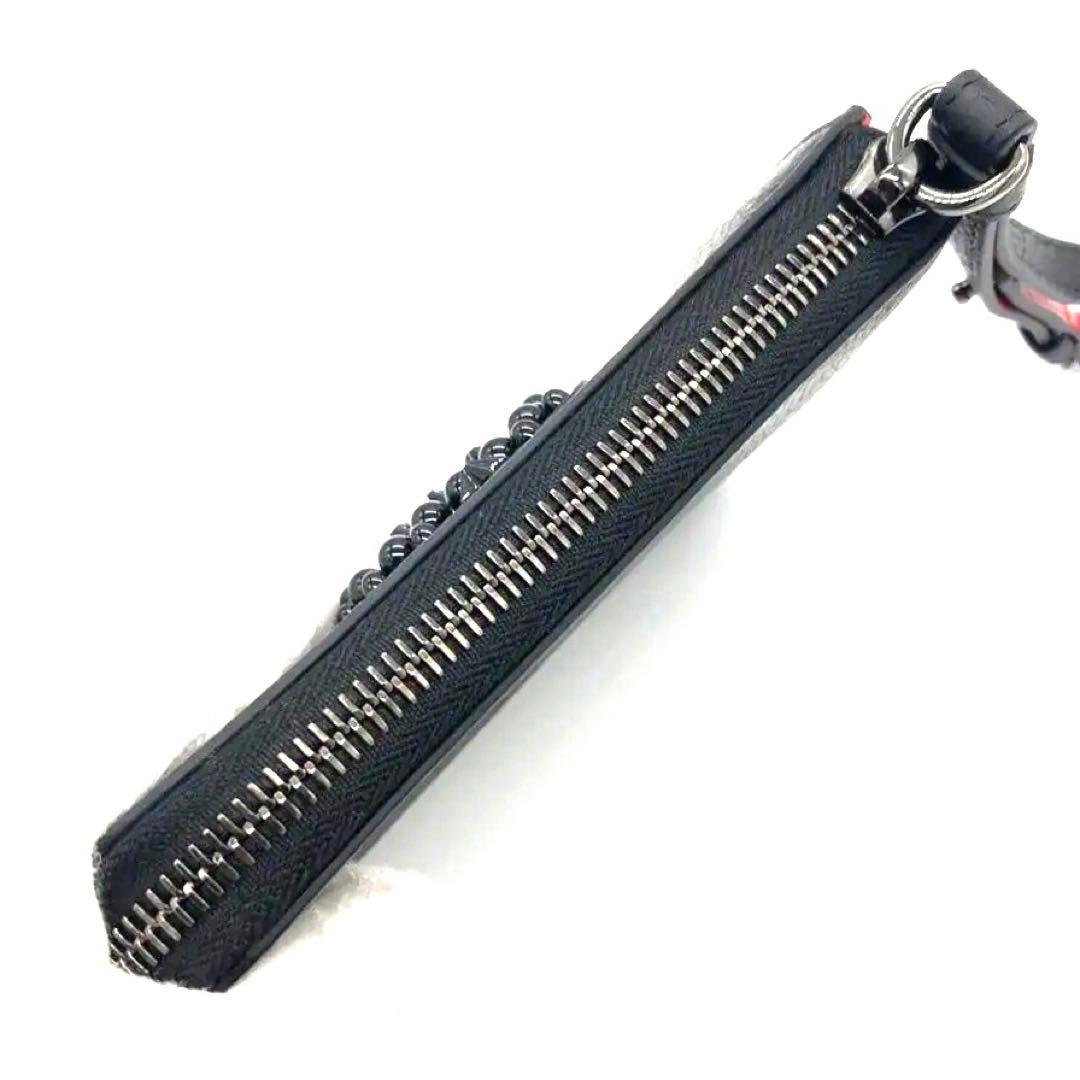 未使用✨クリスチャンルブタン レザー　二つ折り財布 L字ファスナー　 スタッズ