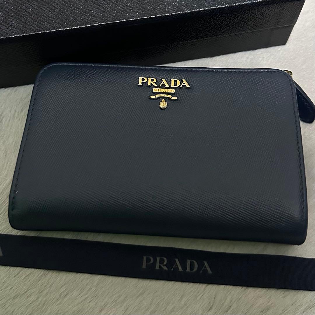 PRADA プラダ　折り財布　ラウンドファスナー　ブルー　ゴールドロゴ