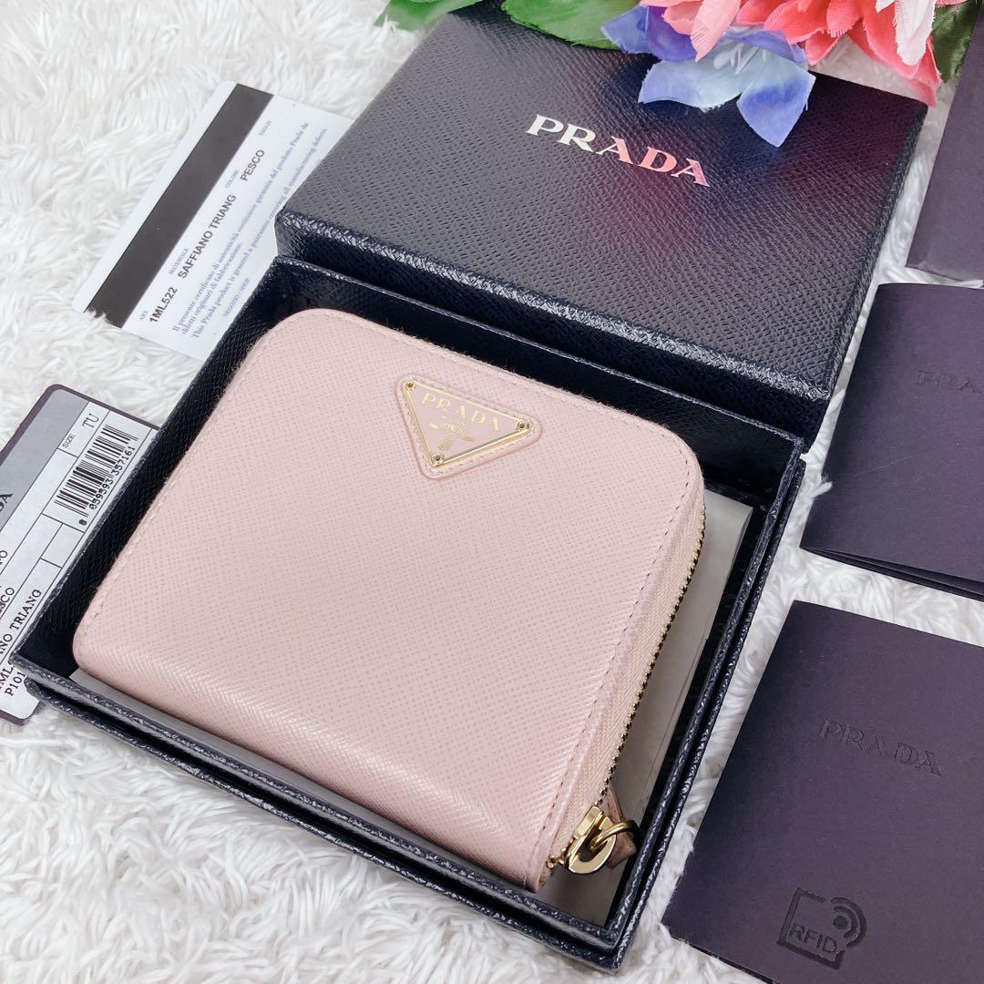 プラダ 二つ折り財布 ラウンドジップ　サフィアーノレザー ピンク 1ML522
