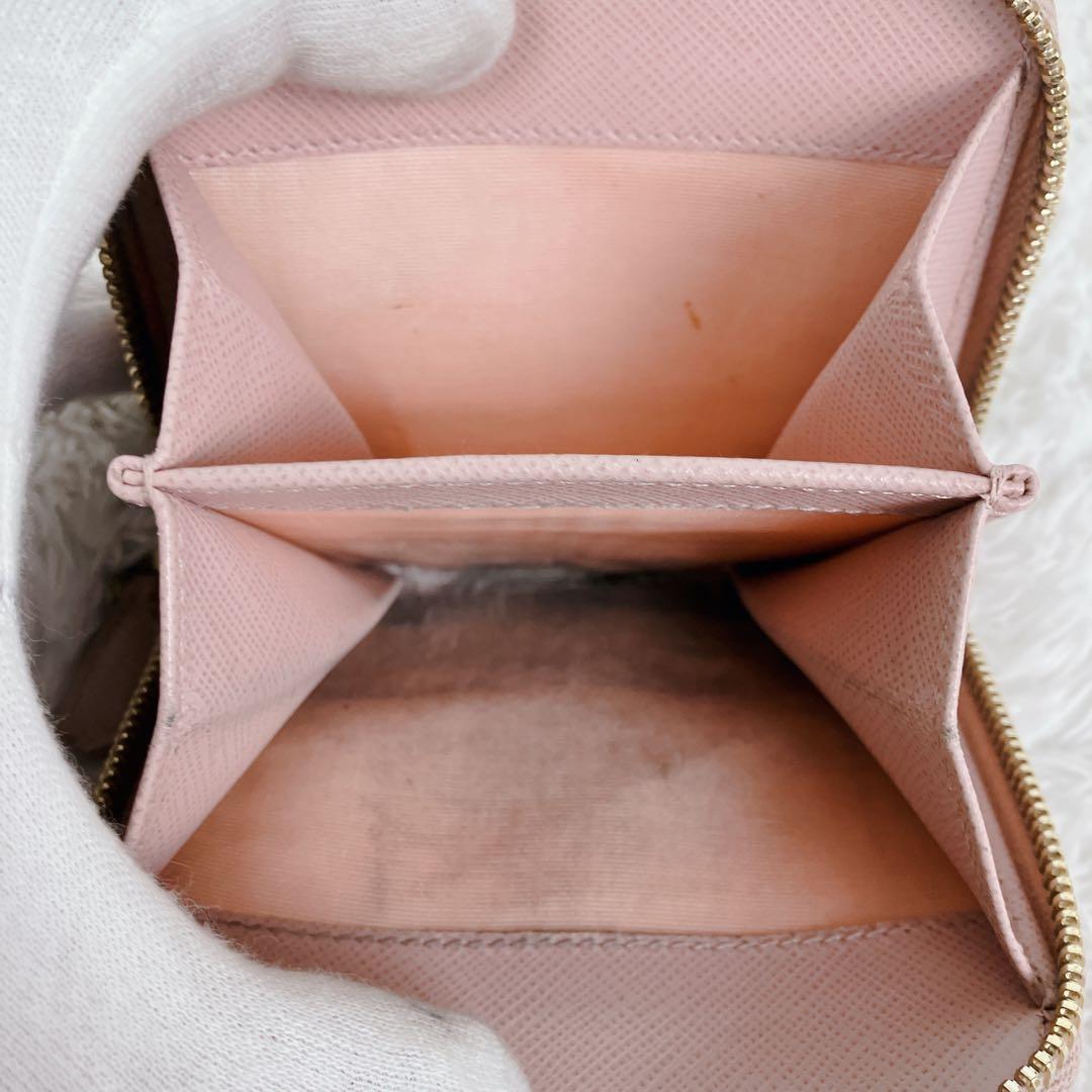 プラダ 二つ折り財布 ラウンドジップ　サフィアーノレザー ピンク 1ML522