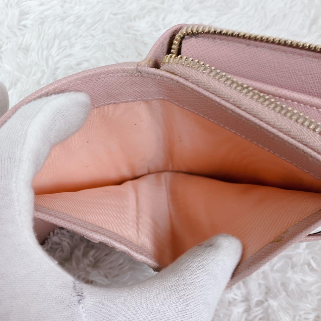 プラダ 二つ折り財布 ラウンドジップ　サフィアーノレザー ピンク 1ML522