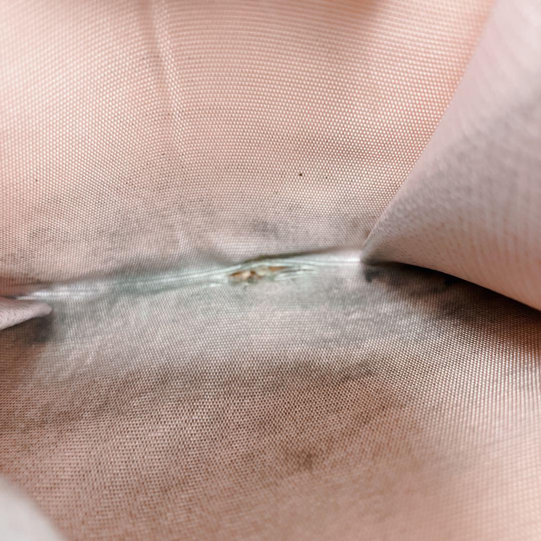 プラダ 二つ折り財布 ラウンドジップ　サフィアーノレザー ピンク 1ML522