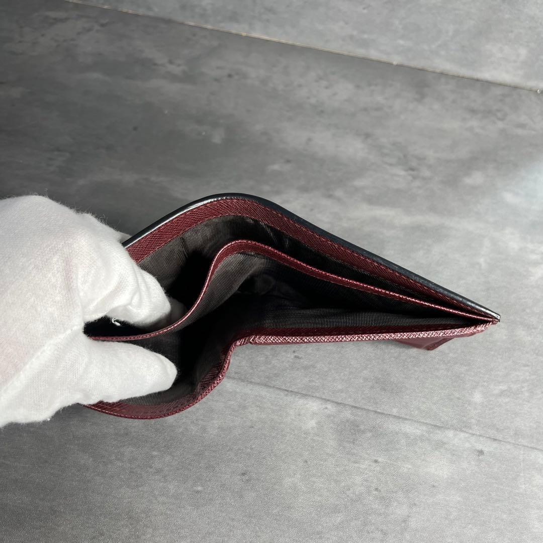 PRADA プラダ 二つ折り財布 小銭入れ付き サフィアーノレザー ネイビー