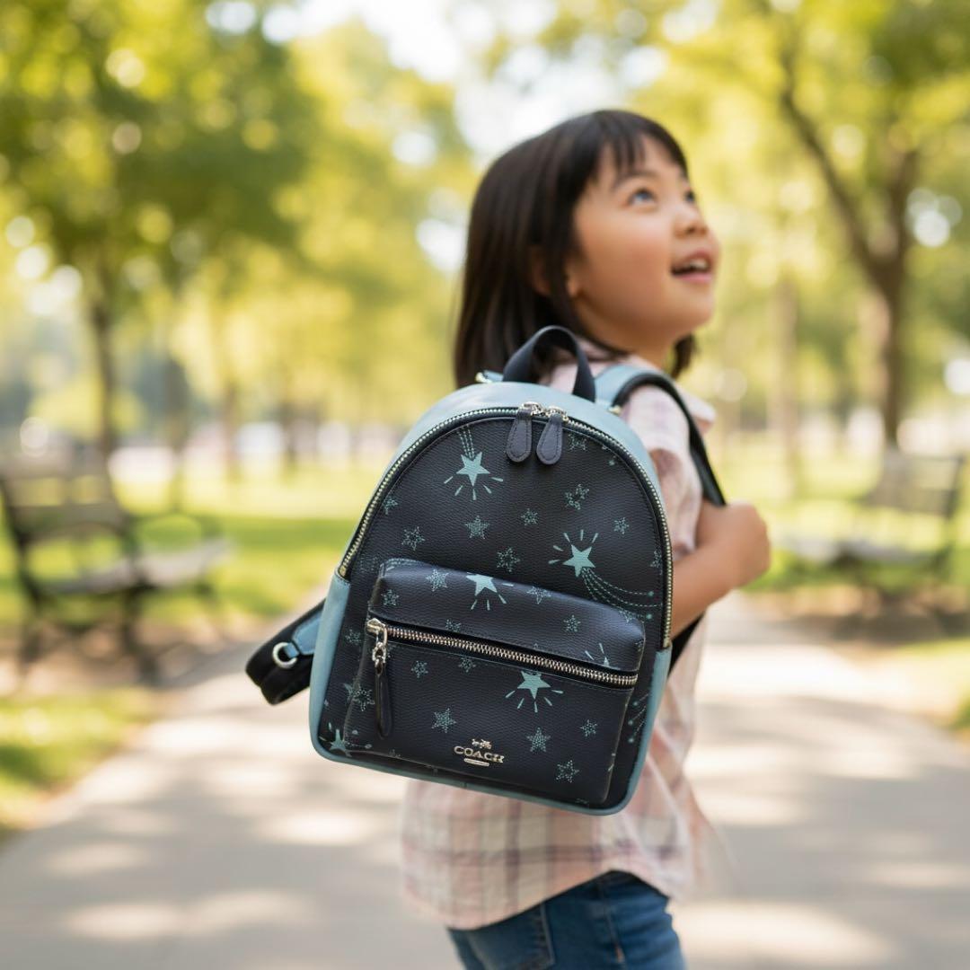 希少✨コーチ リュック ミニチャーリー 星柄 ネイビー レザー バイカラー