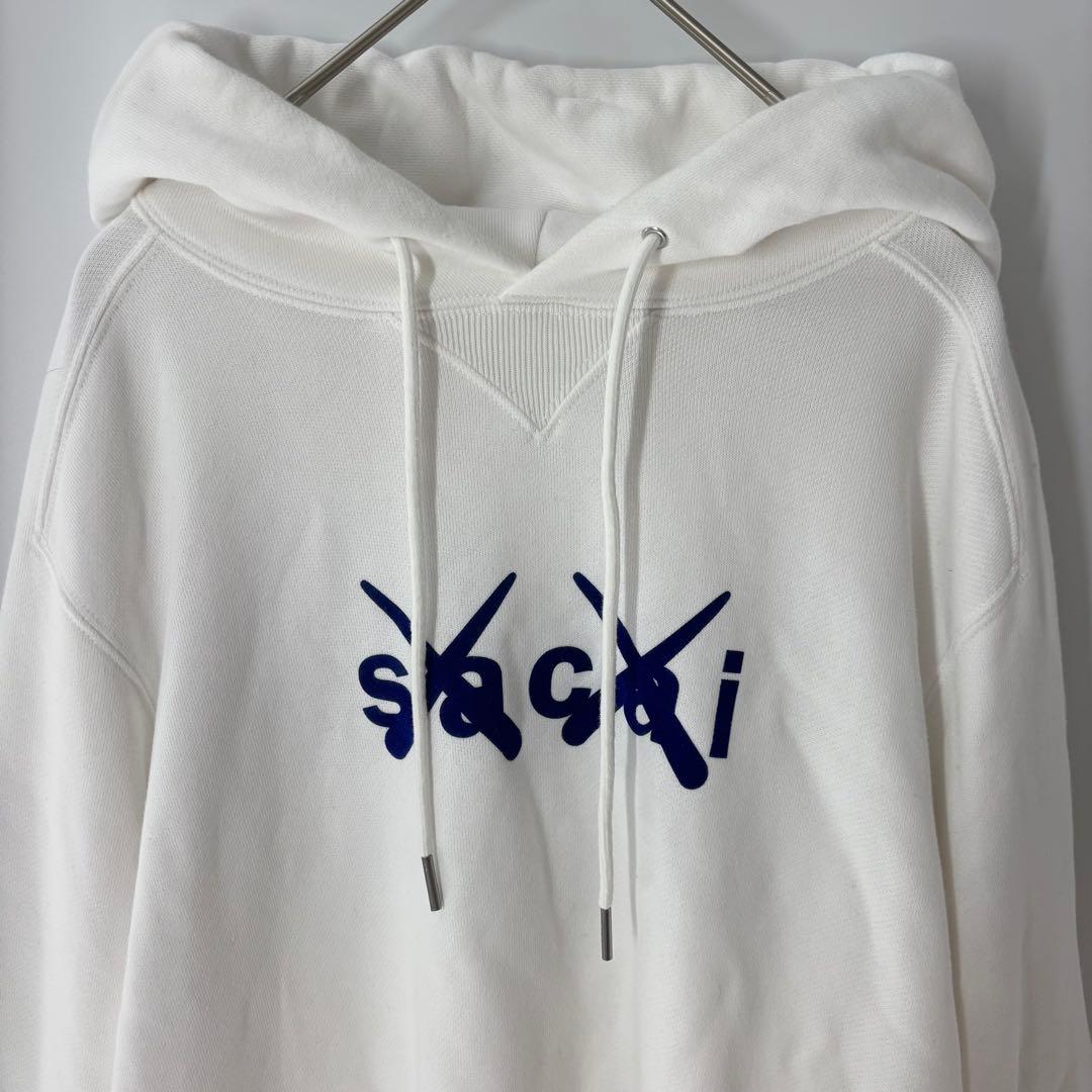 【美品】サカイsacai☆カウズKAWS コラボ　ロゴ　スウェット　パーカー　M