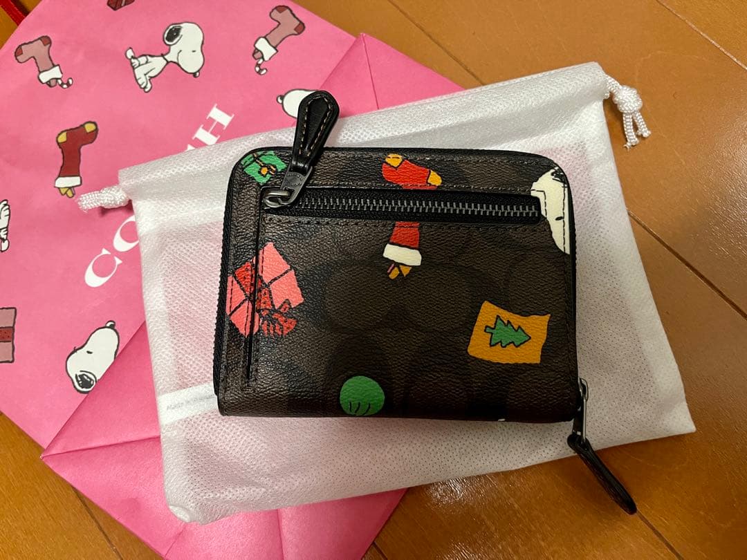 COACH スヌーピー 二つ折り財布　ショッパー付き
