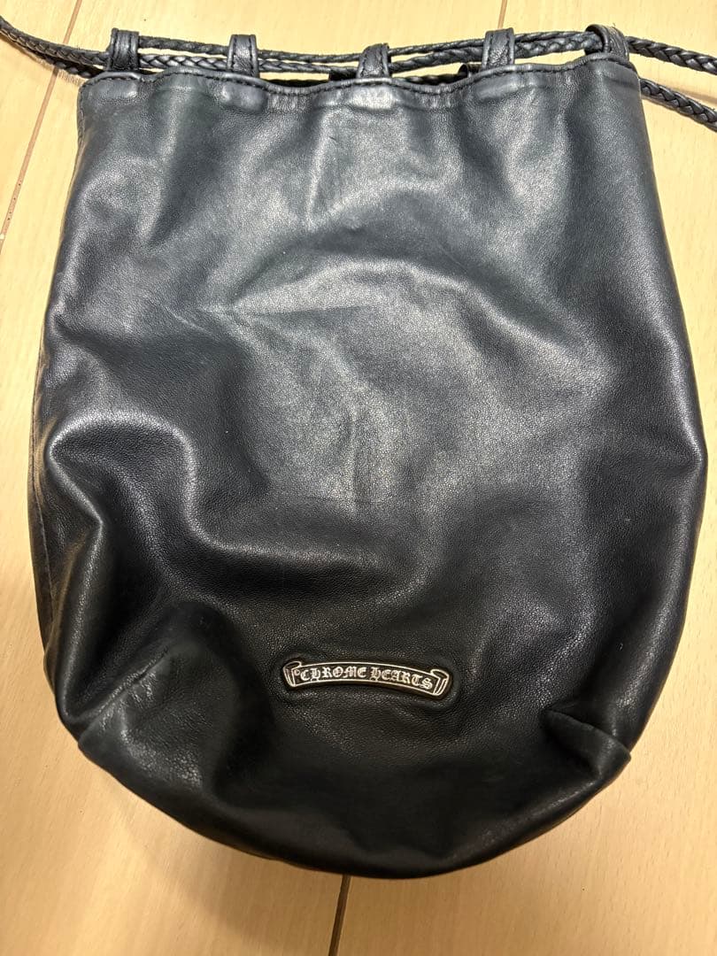 クロスパッチドローストリングサックレザー巾着ハンドバッグ