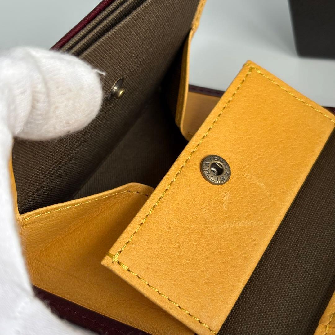 m+ エムピウ ミッレフォッリエⅡ P25 ワイン イエロー 二つ折り財布